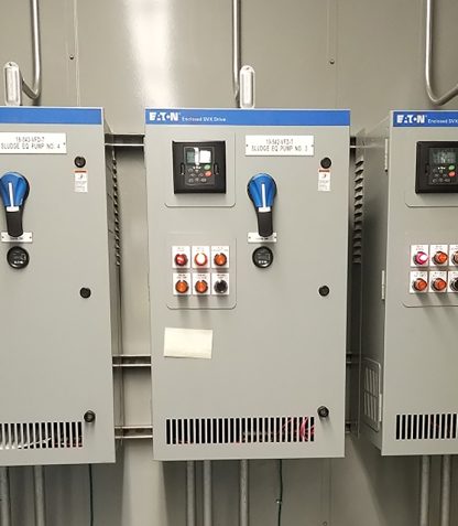 A group of electrical panels in the Deer Valley Water Treatment Plant room.
